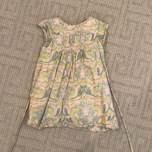 Spring Flowers boutique brand. A pink paisley dress with crystal detail